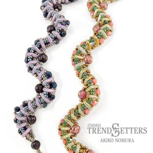May include: Two beaded bracelets with a wavy design. The bracelet on the left is purple, blue, and silver. The bracelet on the right is pink, green, and gold. The bracelets are both made with small beads and have a toggle clasp. The text "Starman Trendsetters Akiko Nomura" is visible in the image.