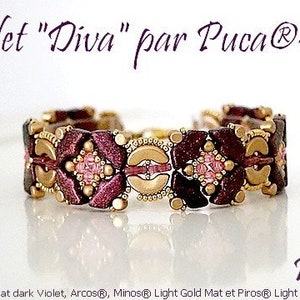 May include: A close-up of a beaded bracelet with a dark purple, gold, and pink color scheme. The bracelet is made with small beads and has a delicate, intricate design. The bracelet is labeled "Diva" and is by the brand Puca.