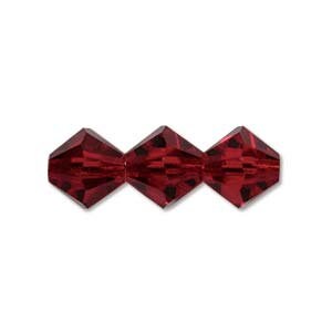 May include: Three red faceted glass beads, each with a square shape.