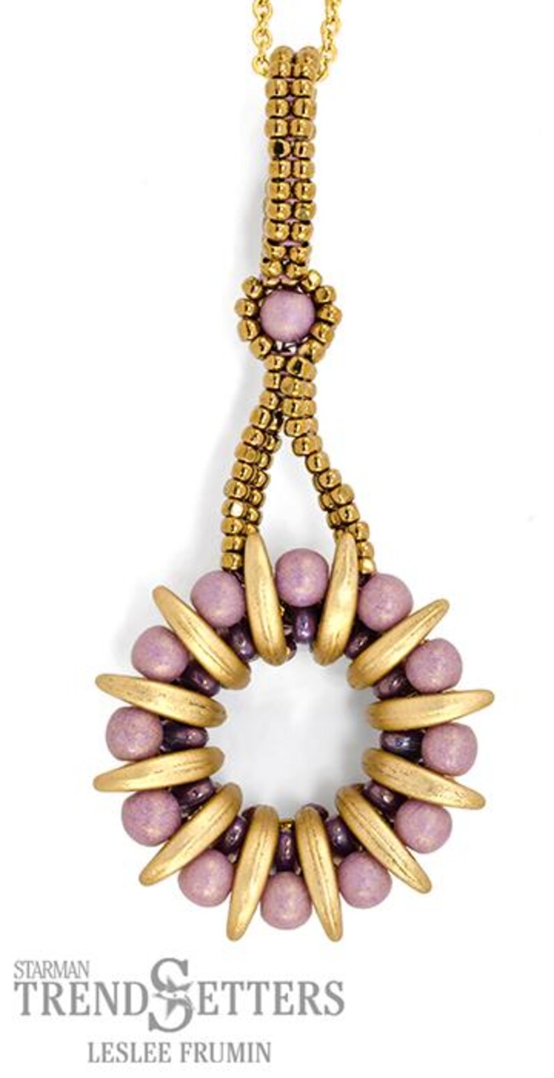May include: A gold and purple beaded necklace with a pendant featuring a circle of beads with a gold center.