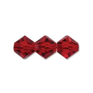 May include: Three red crystal beads with a faceted design.