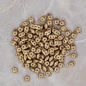 SuperDuo, Bronze Pale Gold, Matte Metallic Flax, 2 hole Beads, (duo500030-01710), 2.5mmx5mm, 9 grams