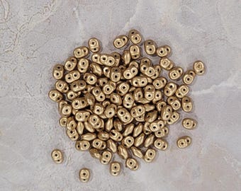 SuperDuo, Bronze Pale Gold, Matte Metallic Flax, 2 hole Beads, (duo500030-01710), 2.5mmx5mm, 9 grams