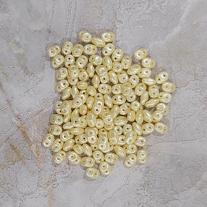 MiniDuo, Pastel Creme, 2-Loch-Rocailles. (duo425039), 2mmx4mm, 9 Gramm