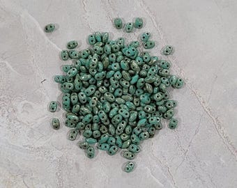 MiniDuo, 2 Hole Seed Bead. Turquoise Green Picasso, (duo463130-43400), 2mmx4mm, 9 grams