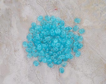 SuperDuo, Frozen Matte Light Turquoise, Perles 2 trous, (364-25-54201), 2,5 mm x 5 mm, 9 g