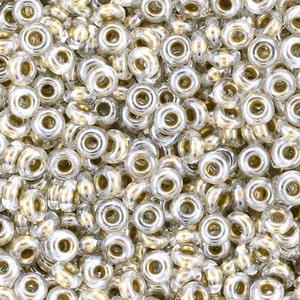 Demi 11-989, Toho, 7.2g Gold Lined Crystal Demi 11-989, Toho, 7.2g Gold Lined Crystal