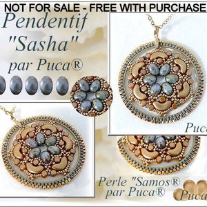 May include: A gold and gray beaded pendant necklace with a round pendant featuring a floral design. The pendant is labeled "Sasha" and "Puca".