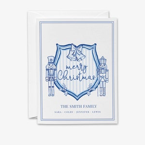 Cartões personalizados com o tema Quebra-Nozes em formato de brasão de Natal | Cartões comemorativos azuis e brancos | Papelaria personalizada da família Quebra-Nozes | Cartão de Natal