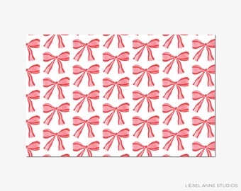 May include: A repeating pattern of red bows on a white background. The bows are evenly spaced and detailed, creating a festive design. The bows are a vibrant red colour, and the pattern is reminiscent of gift wrapping.