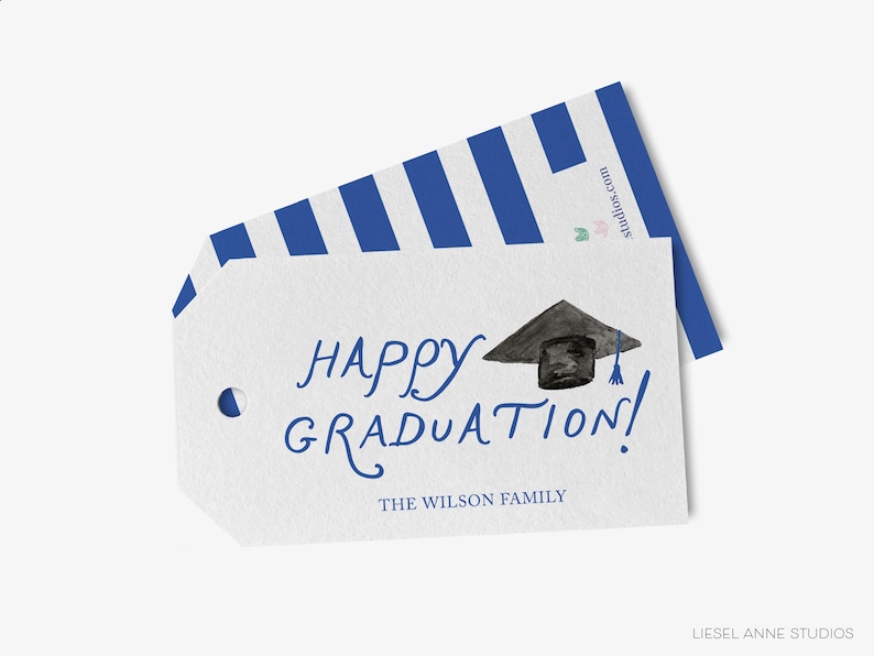 The image is a graduation gift tag with a graduation cap and mortarboard on it, along with the text "Happy Graduation!" and "The Wilson Family".