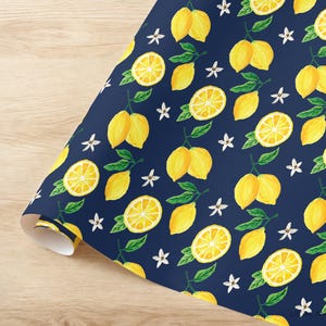 a blue wrapping paper with yellow lemons on it