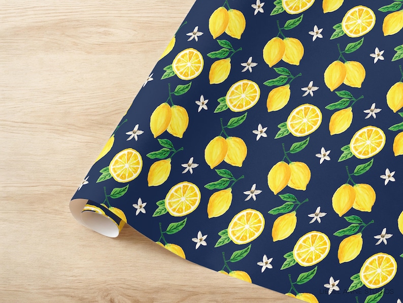 a blue wrapping paper with yellow lemons on it