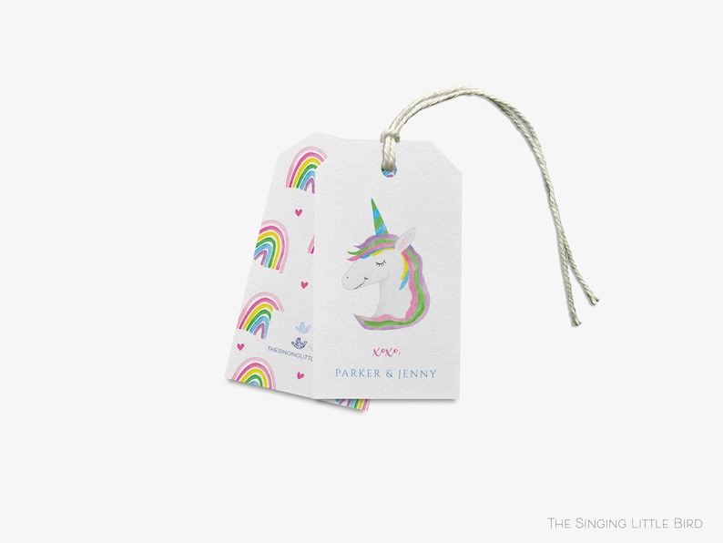 May include: A white gift tag with a unicorn illustration and rainbow pattern. The tag has a hole at the top for string and says "xxx, Parker & Jenny" at the bottom.