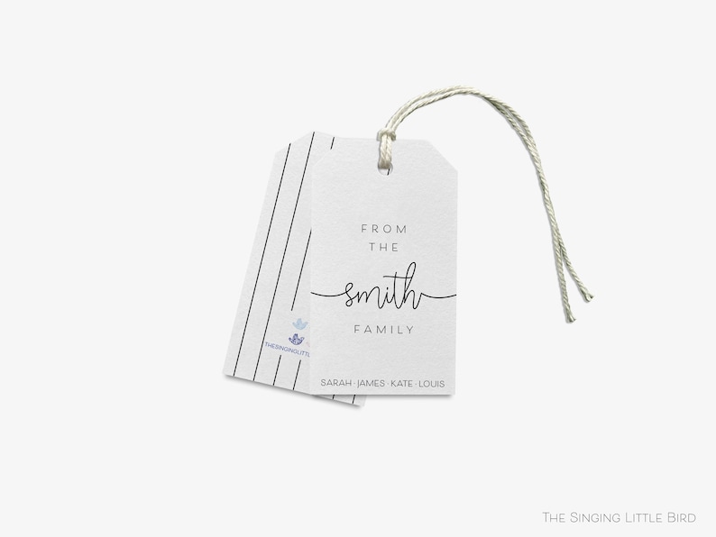 May include: White gift tag with black text that reads "From the Smith Family" and "Sarah James Kate Louis". The tag is attached to a string.