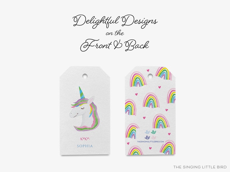 May include: Two gift tags with a unicorn and rainbow design. The front tag features a watercolor illustration of a unicorn with a rainbow mane and horn. The back tag features a repeating pattern of colorful rainbows with pink hearts.
