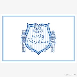 Op de afbeelding: Blauwe en witte kerstkaart met een wapenschild met twee notenkrakers en de tekst "merry Christmas".