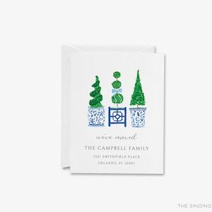 The image is a greeting card with a design featuring three potted plants with blue and white vases, arranged in a row. The card is addressed to "The Campbell Family" and includes the address "3121 Smithfield Place, Orlando, FL 32801".