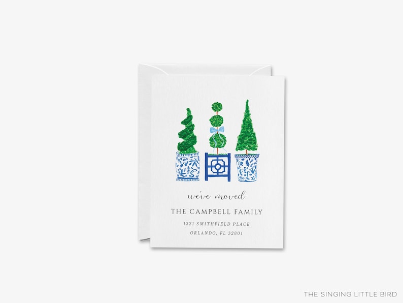 The image is a greeting card with a design featuring three potted plants with blue and white vases, arranged in a row. The card is addressed to "The Campbell Family" and includes the address "3121 Smithfield Place, Orlando, FL 32801".