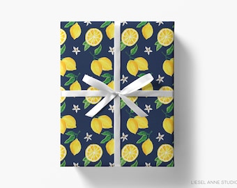 May include: A navy blue wrapping paper with a repeating pattern of yellow lemons and white blossoms.