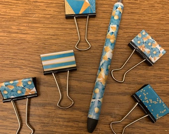 Gold and teal floral pen and binder clip set