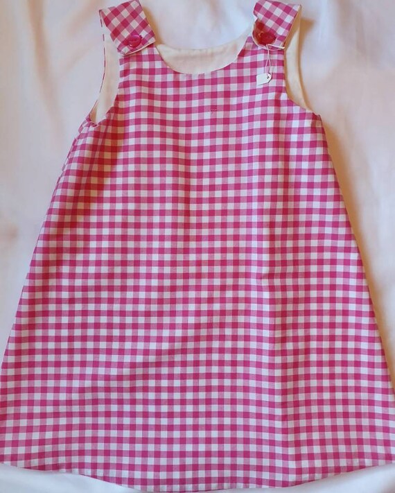 pink check pinafore