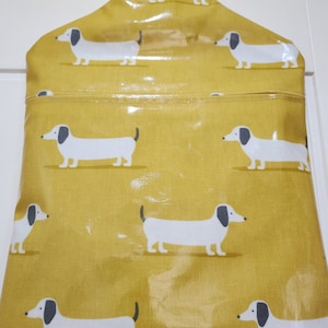 Peg bag,peg storage,oilcloth peg bag,peg storage,clothes peg holder,clothes pin bag, yellow sausage dog oilcloth peg bag