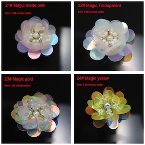 May include: Four flower-shaped embellishments with sequin petals and central bead accents. Each piece measures 1.96 inches in width. The set includes 21# Magic matte pink, 22# Magic Transparent, 23# Magic gold, and 24# Magic yellow variations.
