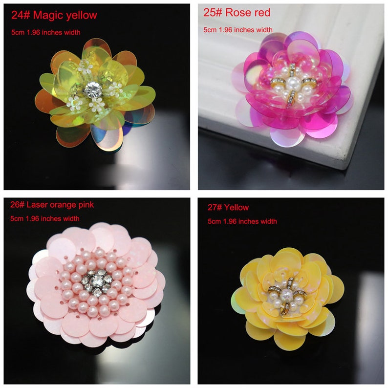 May include: Four decorative flower appliques with 1.96 inches width. 24# Magic yellow features iridescent petals and a central crystal. 25# Rose red has pink petals with a pearl and crystal center. 26# Laser orange pink has light pink petals with a pearl and crystal center. 27# Yellow has yellow petals with a pearl and crystal center.
