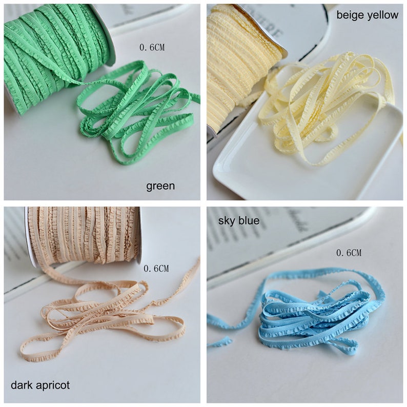 Pu&ograve; includere: Quattro bobine di passamaneria arricciata larga 0,6 cm in beige giallo, verde, albicocca scuro e azzurro cielo.