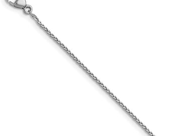 May include: A silver chain necklace with a lobster clasp.