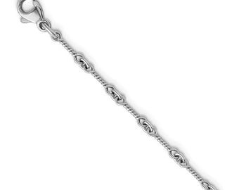May include: A silver-toned chain bracelet featuring a repeating pattern of twisted rope-style links alternating with smooth, elongated oval links. The chain is secured with a polished lobster claw clasp at one end, showcasing a metallic finish.