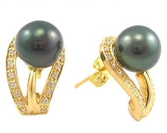 May include: A pair of gold earrings with black pearls and clear cubic zirconia stones. The earrings have a curved design and are set in a gold setting.