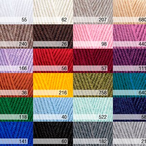 May include: A color chart with 24 yarn samples, each with a number printed below. The colors include white, beige, brown, pink, purple, red, orange, yellow, green, blue, black, and gray.