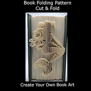 May include: A book folding pattern for a mermaid, with the text "Book Folding Pattern Cut & Fold" and "Create Your Own Book Art".