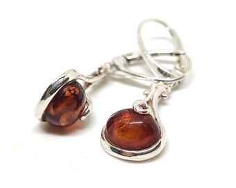 Silver earings with amber