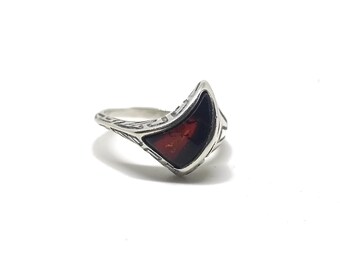 Silver ring with amber