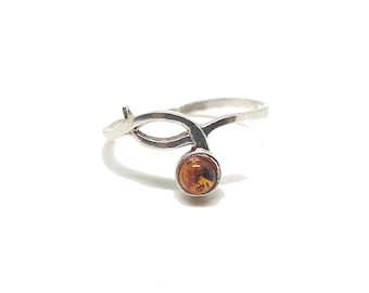 Silver ring with amber