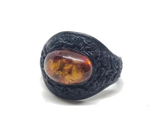 Handmade black Leather ring with natural Baltic amber