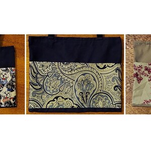 May include: Three tote bags with different fabric patterns. The first bag has a black top and a bottom with a pattern of small dogs. The second bag has a black top and a bottom with a paisley pattern in gold and blue. The third bag has a green top and a bottom with a floral pattern in red and white.