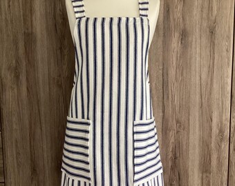 Large cross back apron with two pockets. Japanese apron in a thick, soft woven cotton fabric. Iliv Vermont Riviera. Blue and white stripes.