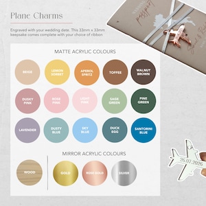 May include: Image of plane charms with colour options. The charms are 33mm x 33mm and engraved with a wedding date. Colour options include beige, pink, blue, and gold. The text "Plane Charms" is at the top.