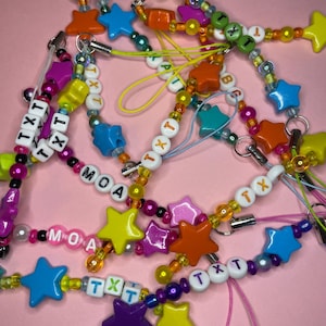 txt star phone charms
