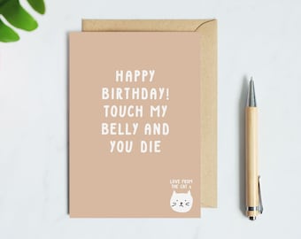 May include: A light brown card with a white cat illustration and the text "Happy Birthday! Touch my belly and you die. Love from the cat."
