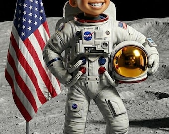 May include: A smiling astronaut in a white spacesuit stands on the moon, holding a gold helmet. The American flag waves in the background. The Earth is visible in the distance. The astronaut has a NASA patch on the suit.