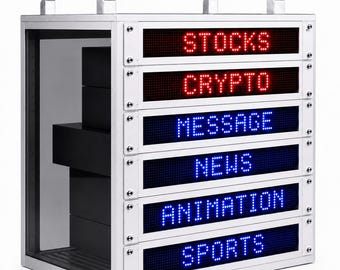 May include: A silver metal display case with a clear glass front and a handle on top. The case has six LED displays showing the words "STOCKS", "CRYPTO", "MESSAGE", "NEWS", "ANIMATION", and "SPORTS". Inside the case are black boxes.