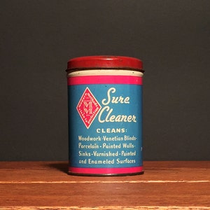 soy candle in an old Sure Cleaner can with lid