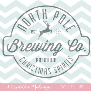 May include: A gray and white circular logo with the text "North Pole Brewing Co." and "Christmas Spirits" around the edge. A reindeer silhouette is in the center with the text "est 1824".