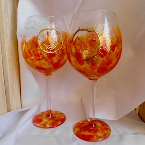 Set of two hand painted Sunny Daze wine glasses that are dishwasher safe