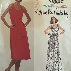 May include: A vintage sewing pattern for a dress by Diane von Furstenberg. The pattern is for a sleeveless dress with a scoop neck and a tie belt. The pattern is from Very Easy Vogue and is labeled as an American Designer Original.